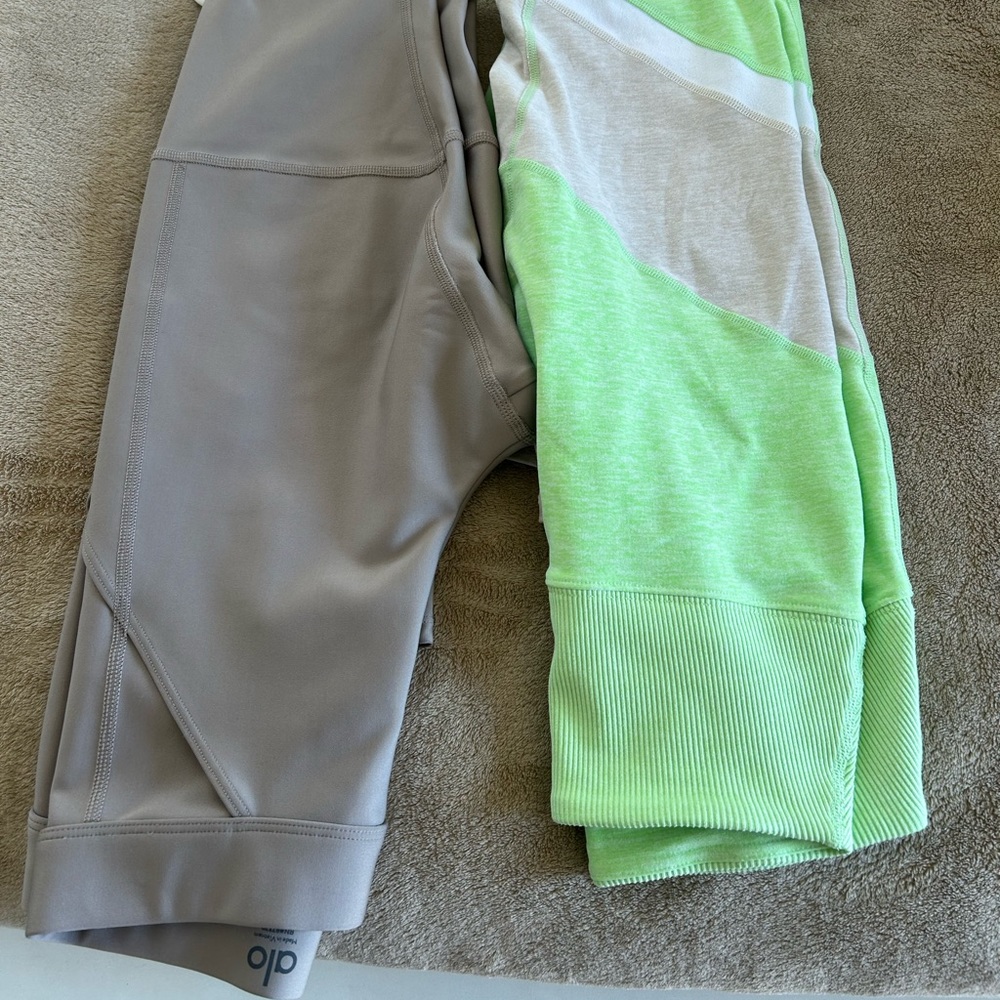 Two pair of alo leggings together